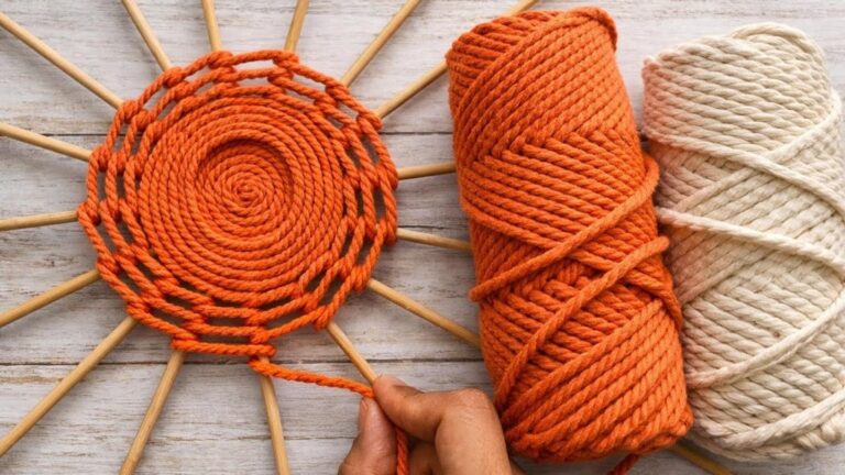 This simple gesture turns cardboard rolls into an eye-catching yarn organizer…